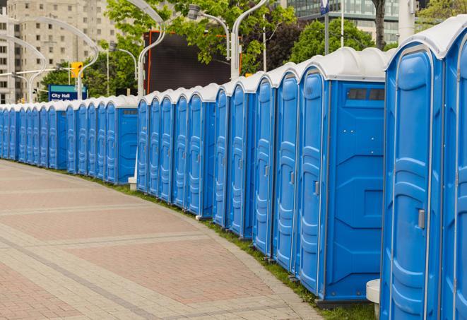 a row of portable restrooms at a fairground, offering visitors a clean and hassle-free experience in lebanon